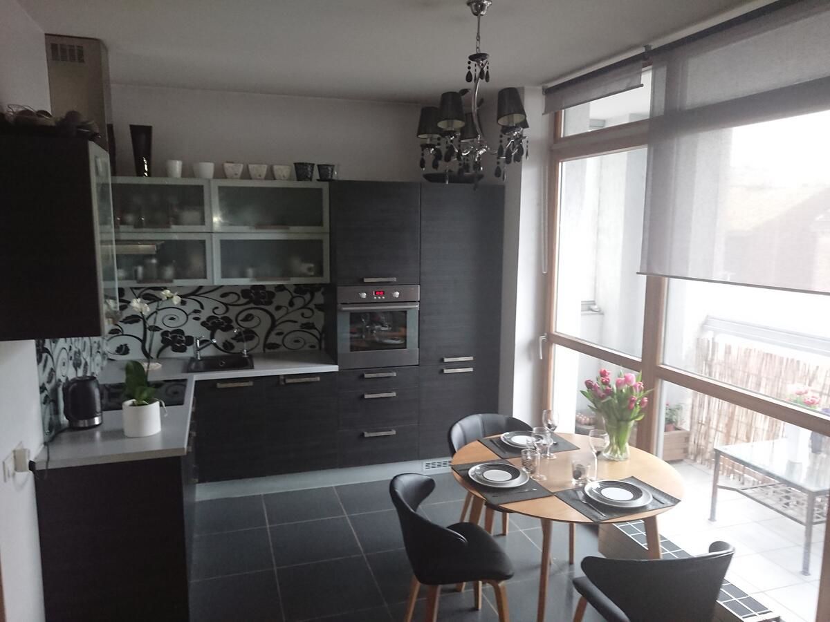 Апартаменты Fashionable Apartment near the Park Ziedoņdārzs Рига